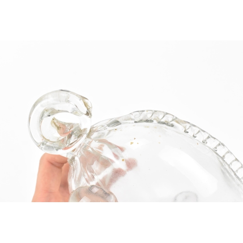 389 - An Edwardian hand blown clear glass novelty decanter, modelled as a seated pig, with silver whisky l... 