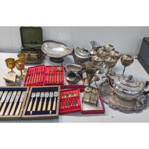 115 - A mixed lot of silver plated items to include a one footed pierced basket, six silver plated goblets... 