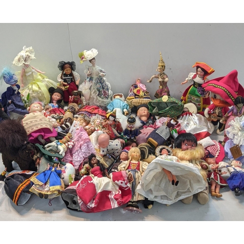 127 - A collection of vintage dolls/toys, along with two teddy bears to include a cat and 'Best Bears' and... 