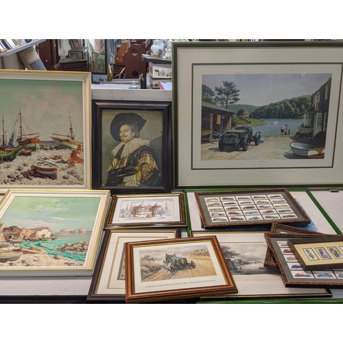 128 - A collection of pictures to include two framed boat docking scenes, oil on board, an oleograph portr... 