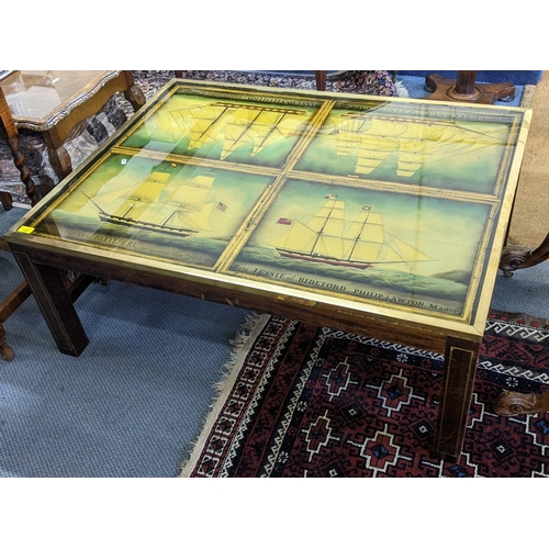 153 - A vintage coffee table having a painted top depicting sailing ships 44.5cm h x 111cm w Location: RAB