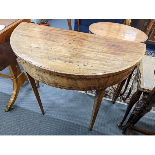 154 - A George III mahogany fold over card table on four tapering legs 73cm h x 95cm w 
Location: RWB