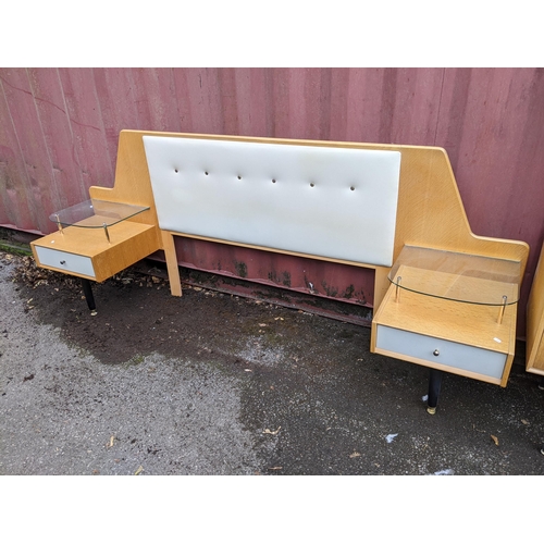 19 - A mid 20th century possibly G-Plan six drawer dressing table together with a similar headboard with ... 