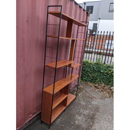 20 - A mid 20th century Ladderax style open bookcase, 211cm h x 122cm w
Location: CON