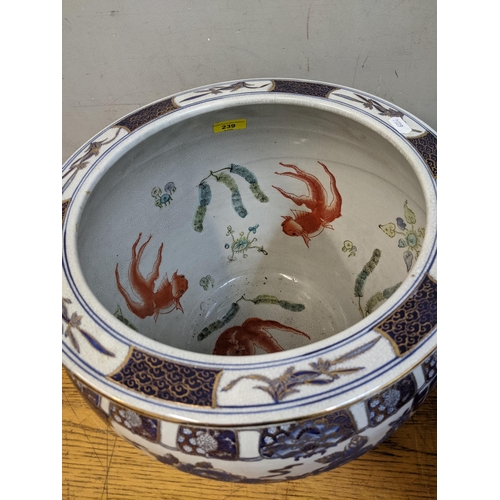 239 - A modern Chinese porcelain goldfish jardiniere, with seal mark to base, a modern Chinese porcelain s... 