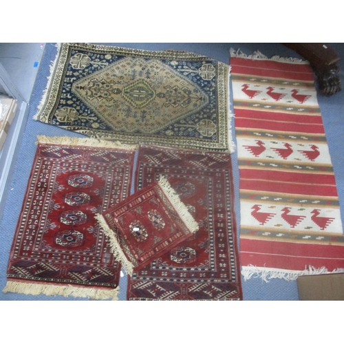 24 - Mixed rugs to include a hand woven rug with a blue and cream ground and diamond motif, 99cm x 66cm
L... 