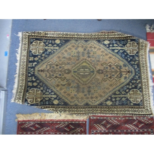 24 - Mixed rugs to include a hand woven rug with a blue and cream ground and diamond motif, 99cm x 66cm
L... 