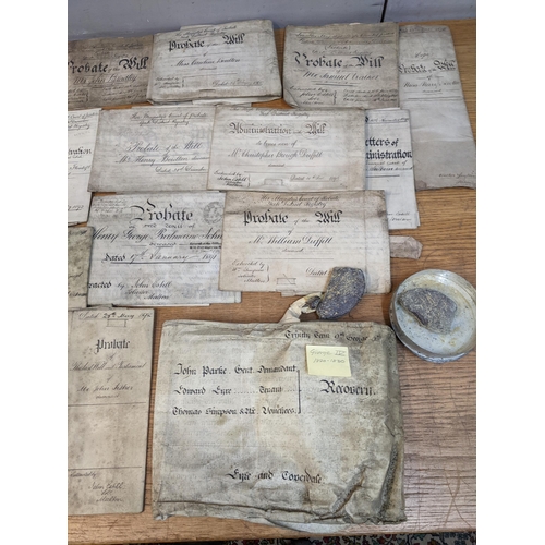 245 - A selection of early to late 19th century solicitors documents of letters of administration, probate... 