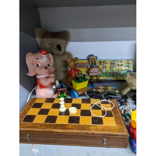 341 - A selection of vintage toys, games and books to include a folding chessboard with plastic chess and ... 