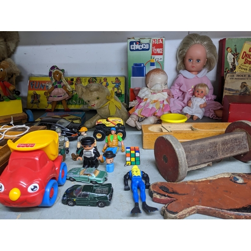 341 - A selection of vintage toys, games and books to include a folding chessboard with plastic chess and ... 