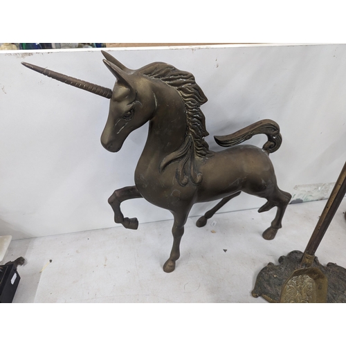 35 - A brass model of a Pegasus 40cm high, a similar model of a Unicorn, along with fireside implements a... 