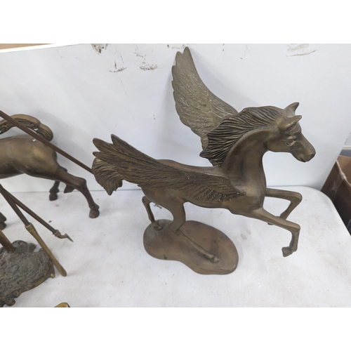 35 - A brass model of a Pegasus 40cm high, a similar model of a Unicorn, along with fireside implements a... 