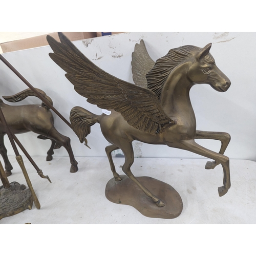 35 - A brass model of a Pegasus 40cm high, a similar model of a Unicorn, along with fireside implements a... 