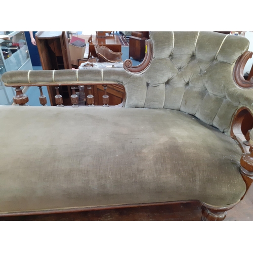 363 - A Victorian oak chaise lounge with green upholstery
Location: A4B