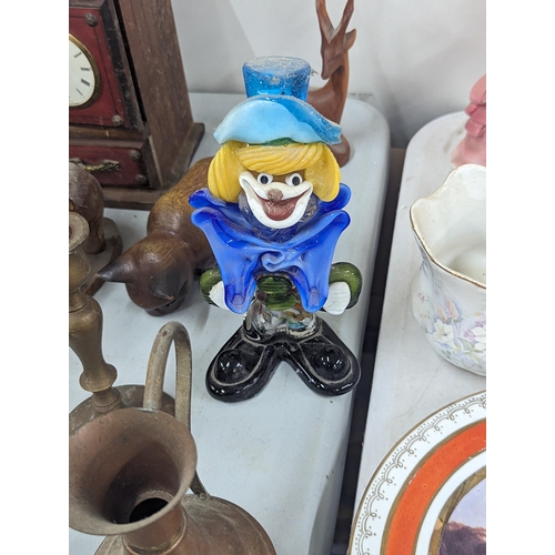 38 - A mixed lot of household ornaments to include a Murano Clown, ceramic pose, models and figures, pict... 