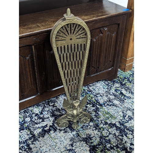 39 - A brass fan fire screen in the form of a phoenix, 58cm high
Location: FSR