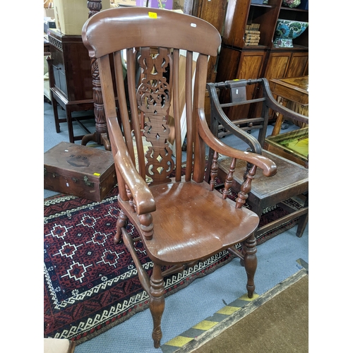 439 - An early 19th century Windsor carver chair together with late 19th century lathe back chair

Locatio... 