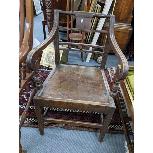 439 - An early 19th century Windsor carver chair together with late 19th century lathe back chair

Locatio... 