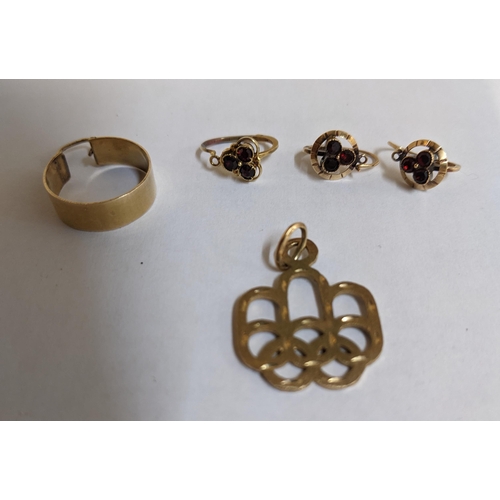 59 - Three 14k gold earrings each set with three stones, gold ear hoop and a 10k gold pendant
Location: C... 