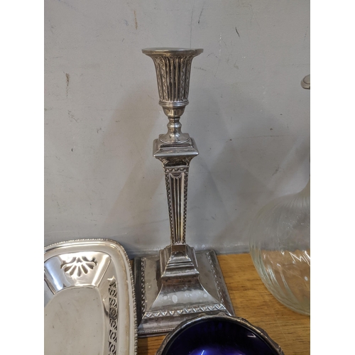 64 - A mixed lot of silver plate to include a pair of neo-classical style Edwardian candlesticks, two gla... 