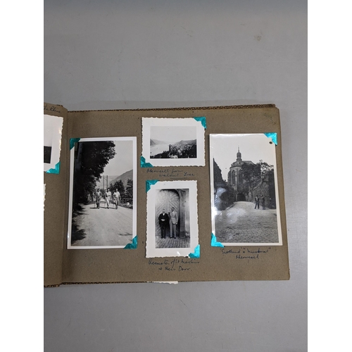 74 - Three photograph albums containing scenes of English towns and cities from 1930s,another with from F... 