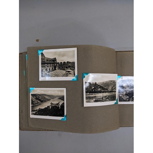 74 - Three photograph albums containing scenes of English towns and cities from 1930s,another with from F... 