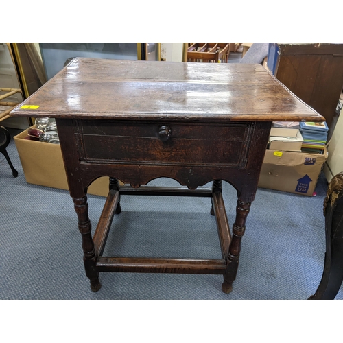 8 - A late 17th/early 18th century oak side table with single inset drawer and on turned legs 72cm h x71... 