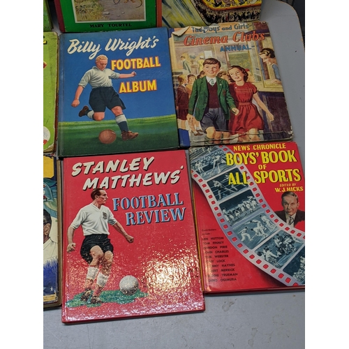 86 - A quantity of children's annuals to include Rupert annual, Toby Twirl, The Boys Book of Soccer for 1... 