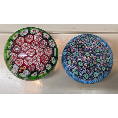 91 - Four Millefiori glass paperweights, largest dia 8cm, smallest 4cm
Location: