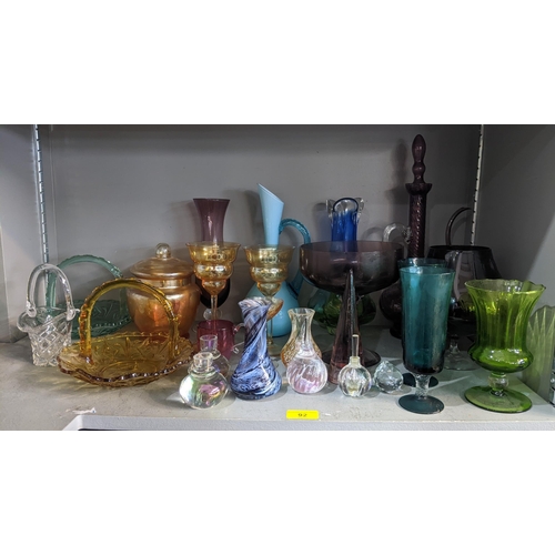 92 - Coloured glassware to include drinking glasses, vases, two glass basket serving dishes and other ite... 