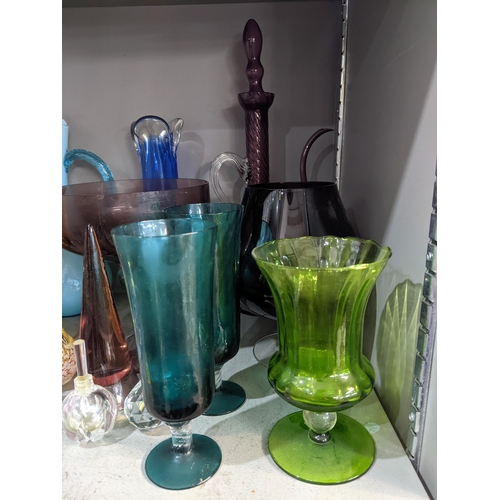 92 - Coloured glassware to include drinking glasses, vases, two glass basket serving dishes and other ite... 