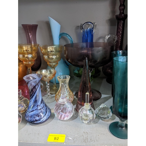 92 - Coloured glassware to include drinking glasses, vases, two glass basket serving dishes and other ite... 