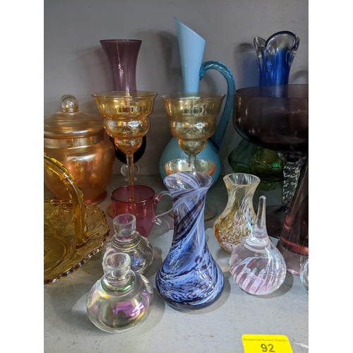 92 - Coloured glassware to include drinking glasses, vases, two glass basket serving dishes and other ite... 