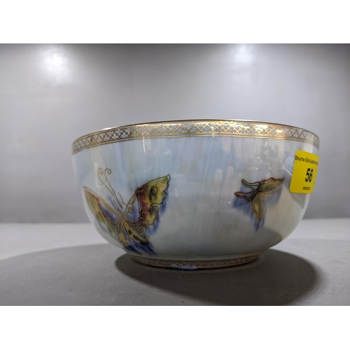 56 - A Wedgwood fairyland lustre ware bowl decorated with butterflies and moths to the exterior, the oran... 