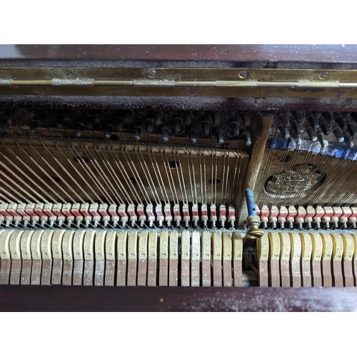 179 - A Bluthner rosewood cased upright piano serial number 71211 with ivory keys, certificate MZZAWWQF Lo... 