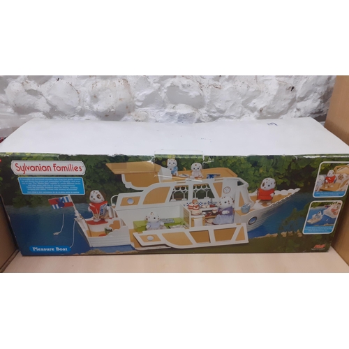 285 - Circa 2000, a Sylvanian Families doll's house with accessories and doll's house furniture (not all S... 