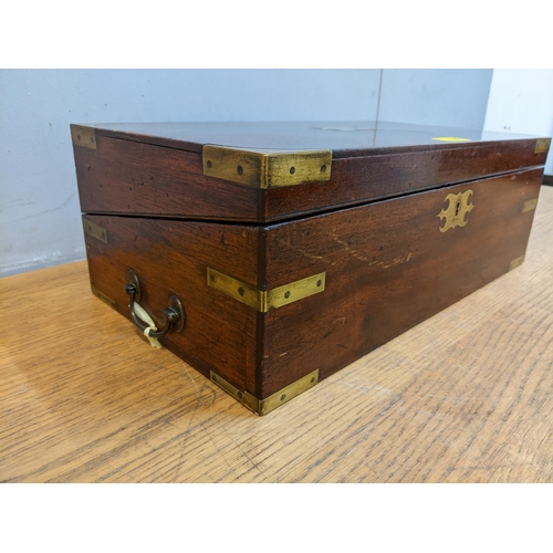 294 - A 19th century military style mahogany writing slope with fitted interior (with key) 15.5cm x 45cm x... 