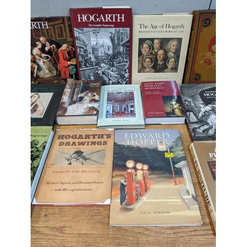 296 - A selection of books to include those on the artist Hogarth, Fine Art and Antiques Collecting to inc... 