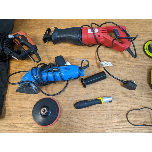 297 - A group of power tools to include a Ryobi 18-volt angle grinder with accessories, in a bag, an Evolu... 