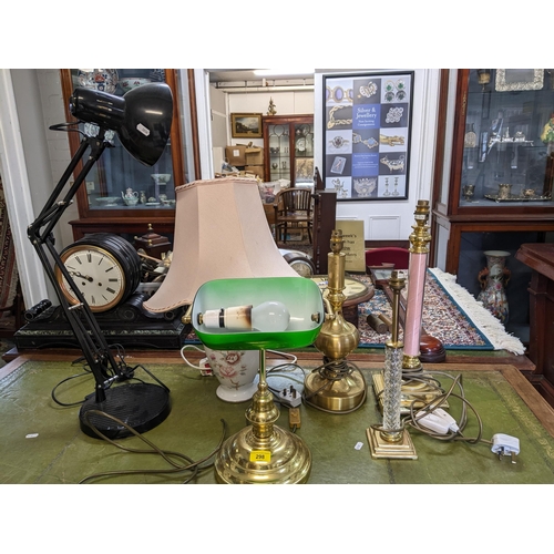 298 - A selection of table lamps to include a brass effect Banker's lamp with green glass shade, a black c... 