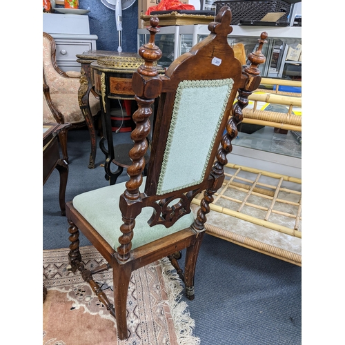 320 - A late Victorian rosewood gothic revival side chair having turned finials and barley twist supports
... 