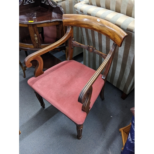 324 - An early 20th century mahogany corner cabinet together with a 19th century mahogany bar back carver ... 