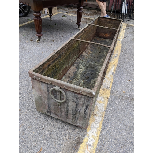 370 - A 19th century galvanised garden trough having ring handles and metal bound studs, 45.5cm h x 213cm ... 