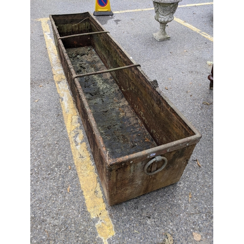 370 - A 19th century galvanised garden trough having ring handles and metal bound studs, 45.5cm h x 213cm ... 