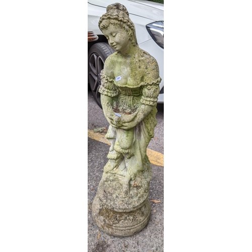 375 - A reconstituted stoneware garden statue of a female raised on circular base, 84cm h
Location: DH