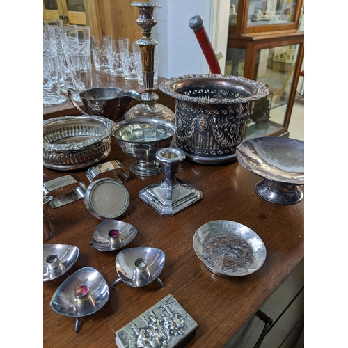 376 - A mixed lot of silver plate to include a pair of Sheffield plated candlesticks, wine coaster and bot... 