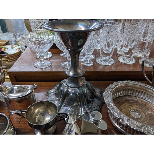 376 - A mixed lot of silver plate to include a pair of Sheffield plated candlesticks, wine coaster and bot... 