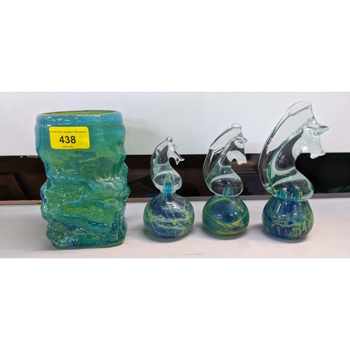 438 - Eight pieces of Mdina glass to include a bubbly blue and green bark textured vase and three seahorse... 