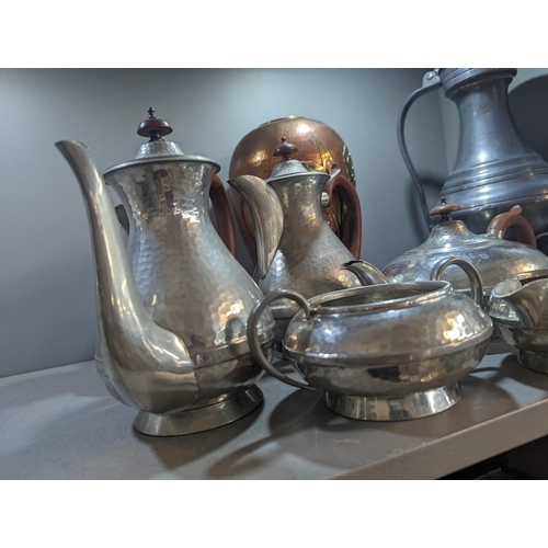 450 - Arts & Crafts pewter tea set comprising tea part, milk jug and sugar and others along with a copper ... 