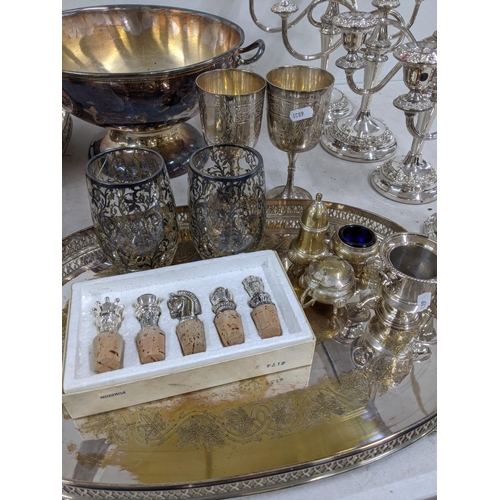 484 - Silver plated items to include a twin handled punch bowl, a pair of goblets having engraved detail, ... 